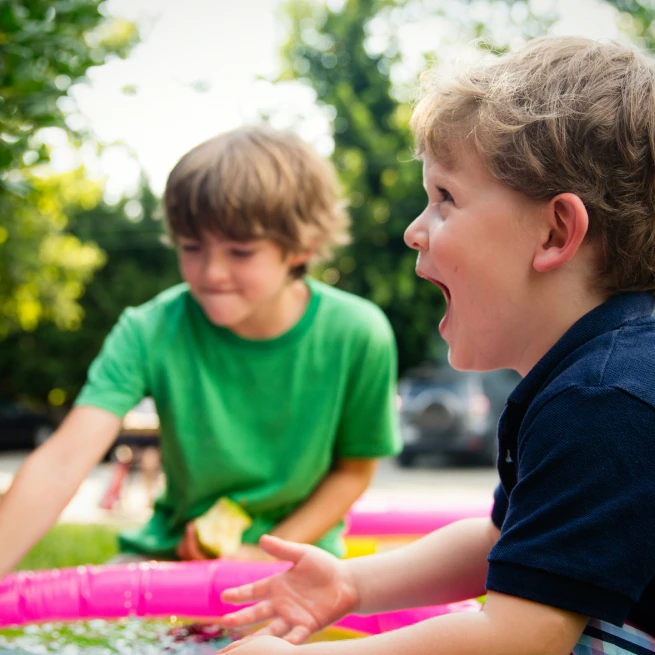 Happy Kids Playing Outdoors